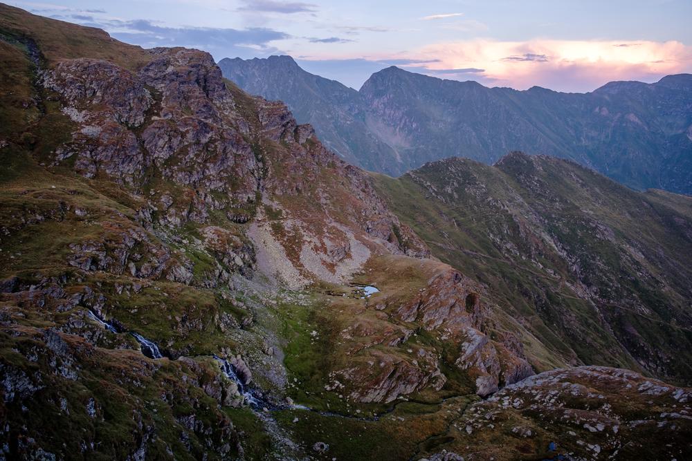 Sunset over a waterfall in the Făgăraș  Mountains, Romania